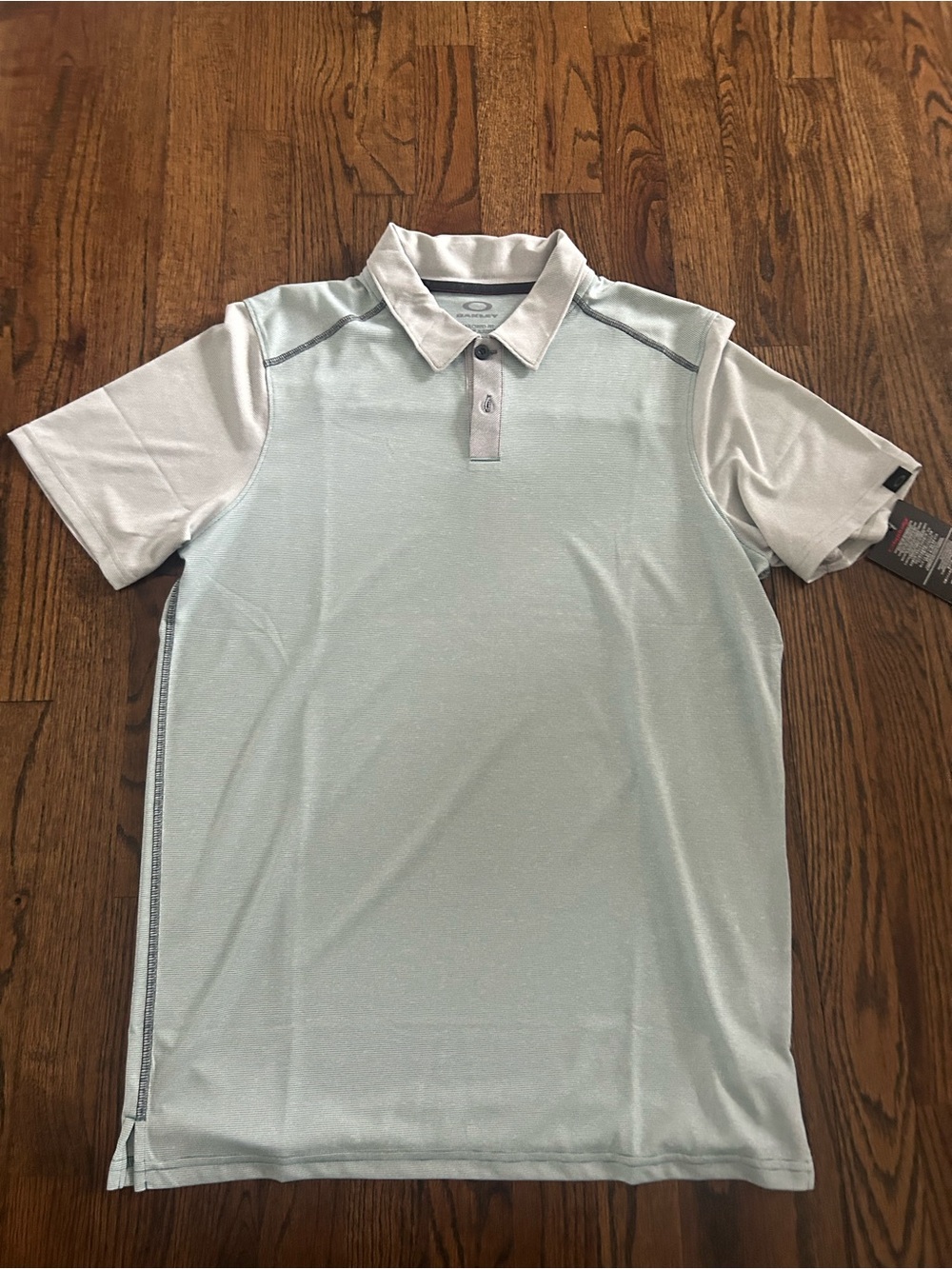 NWT Oakley Men's Light Gray and White Performance Polo (size small)